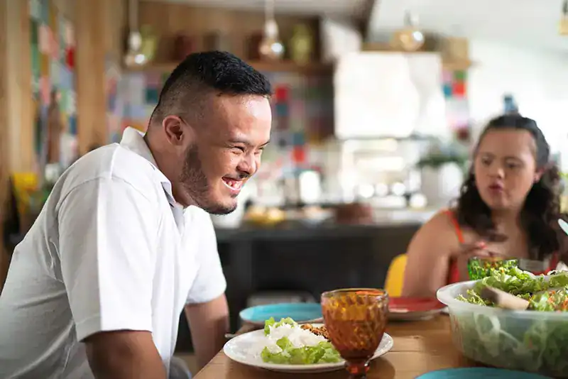 Empowering Weight Loss: A Comprehensive Guide for Individuals with Disabilities 2 Image of a disabled man and balance around nutrition to aid weight loss Blackheath