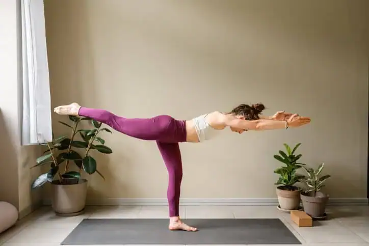Achieving the Perfect Tone: How Often Should You Exercise for Results? 1 Woman doing Yoga exercise Blackheath to help with toning the body.